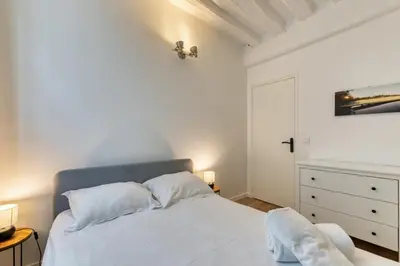 Un ou plusieurs lits dans un hébergement de l'établissement Damien votre F3 2 chambres terrasse à Rouen