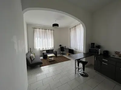 Coin salon dans l'établissement Belle maison quartier Henriville, proche centre