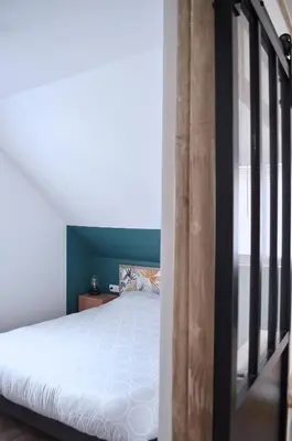 Un ou plusieurs lits dans un hébergement de l'établissement Eco-Appart'hôtel Rouen - SLT