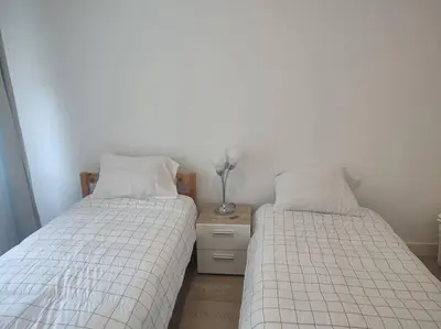 Un ou plusieurs lits dans un hébergement de l'établissement Appartement spacieux cosy en hypercentre proximité Cathédrale, Coliseum