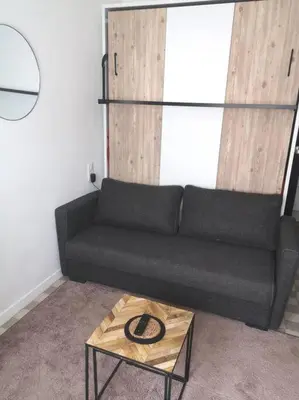 Coin salon dans l'établissement chambre 2 pas du centre-ville