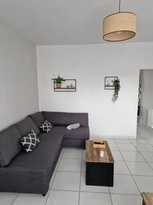 Coin salon dans l'établissement Appart 10 minutes de rouen