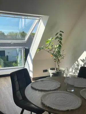 Coin salon dans l'établissement appartement des mésanges