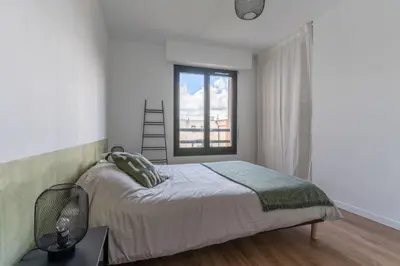Un ou plusieurs lits dans un hébergement de l'établissement ABONDANCE - Logement urbain, lumineux et design pour 4 pers