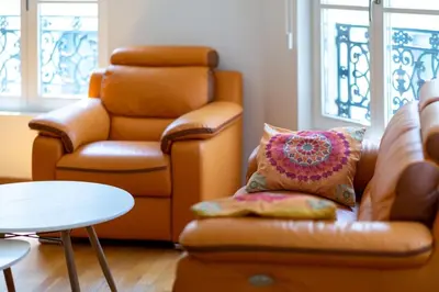 Coin salon dans l'établissement Carlos logement au pied du Gros Horloge !