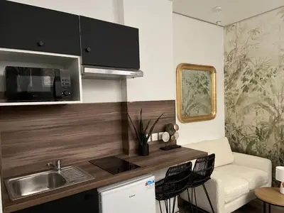 Cuisine ou kitchenette dans l'établissement CosyRouen Bali Jacuzzi & Hamman