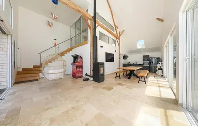 Télévision ou salle de divertissement dans l'établissement Le Loft De La Grange