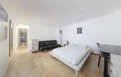 Un ou plusieurs lits dans un hébergement de l'établissement Le Loft De La Grange