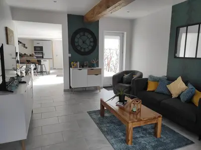 Coin salon dans l'établissement Maison Ville avec Patio entre Mer & Campagne