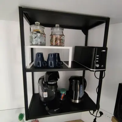 Cuisine ou kitchenette dans l'établissement Studio a 10 min de Rouen - Le Guillaume
