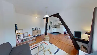 Télévision ou salle de divertissement dans l'établissement Vue sur Seine