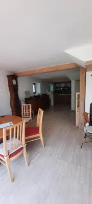 Coin salon dans l'établissement Maison grand jardin 8 personnes