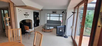 Coin salon dans l'établissement Maison grand jardin 8 personnes