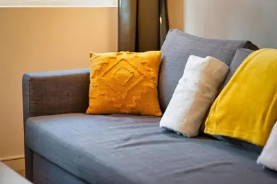 Un ou plusieurs lits dans un hébergement de l'établissement Le Rémi studio rénové au coeur de Rouen