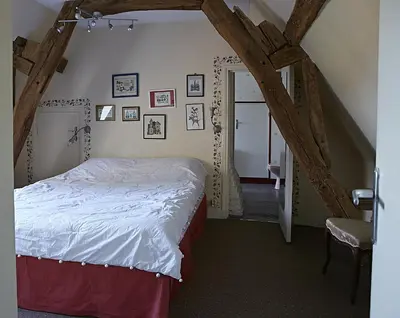 Un ou plusieurs lits dans un hébergement de l'établissement Gîte du Presbytère de L'Abbé L'Hermina