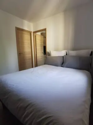 Un ou plusieurs lits dans un hébergement de l'établissement Appartement centre-ville