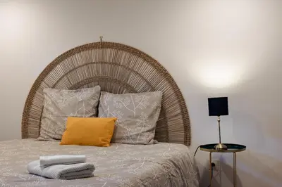 Un ou plusieurs lits dans un hébergement de l'établissement L'impasse - Maison avec jardin proche du centre