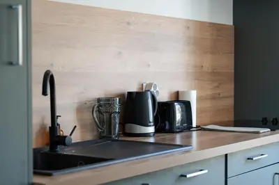 Cuisine ou kitchenette dans l'établissement L'impasse - Maison avec jardin proche du centre