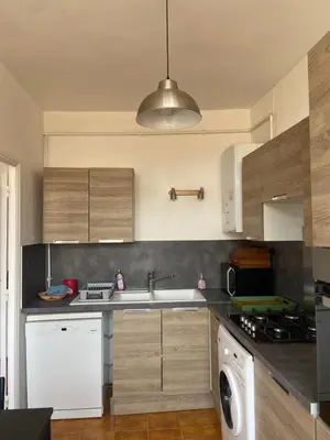 Cuisine ou kitchenette dans l'établissement Appartement duplex de charme
