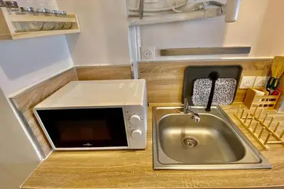 Cuisine ou kitchenette dans l'établissement Le Cocon du Robec