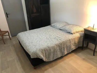 Un ou plusieurs lits dans un hébergement de l'établissement Appartement atypique