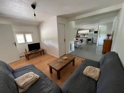 Coin salon dans l'établissement Appartement atypique