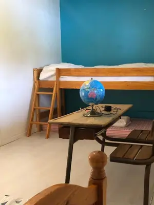 Un ou plusieurs lits dans un hébergement de l'établissement Appartement atypique