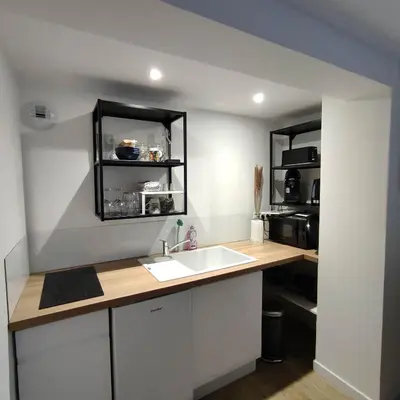 Cuisine ou kitchenette dans l'établissement A 10 min de Rouen - Le Rollon