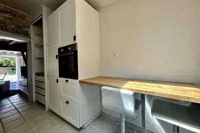 Cuisine ou kitchenette dans l'établissement Le Saint-Ouen charmante maison tout confort !