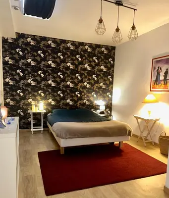 Un ou plusieurs lits dans un hébergement de l'établissement Appartement au cœur du vieux Rouen