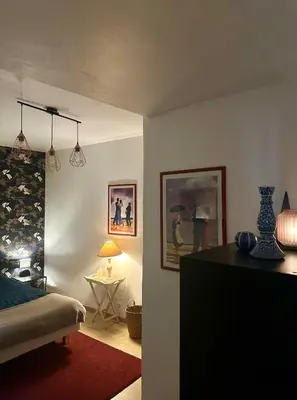 Un ou plusieurs lits dans un hébergement de l'établissement Appartement au cœur du vieux Rouen