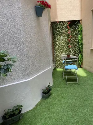Jardin de l'établissement Petite maison hyper centre de Dieppe proche plage