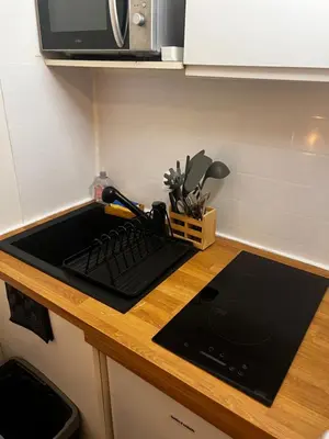 Cuisine ou kitchenette dans l'établissement Lilliputiens
