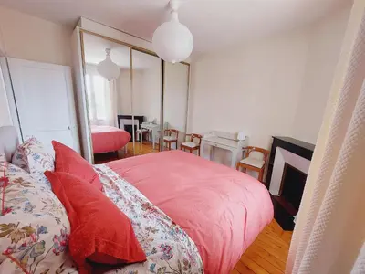 Un ou plusieurs lits dans un hébergement de l'établissement Villa Capucine - Maison de ville avec jardin dans Vernon-Giverny