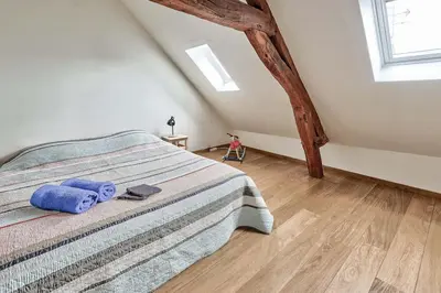 Un ou plusieurs lits dans un hébergement de l'établissement Maison de ville spacieuse et calme en plein coeur d'Amiens