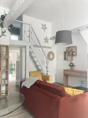 Un ou plusieurs lits dans un hébergement de l'établissement Duplex hypercentre avec parking