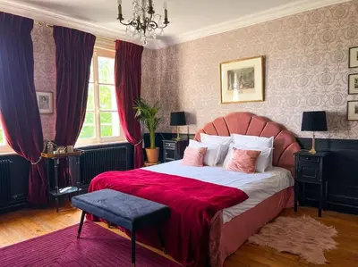 Un ou plusieurs lits dans un hébergement de l'établissement Chambre d'hôtes Sarah - Château Le Bas Bleu