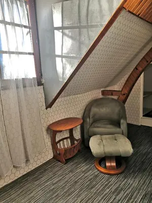 Coin salon dans l'établissement Le nid d'hirondelle