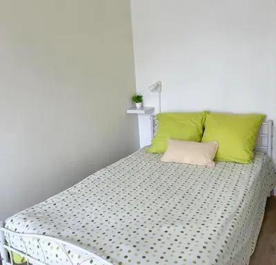 Un ou plusieurs lits dans un hébergement de l'établissement Votre chambre chez l'habitant dans la capitale de la Normandie