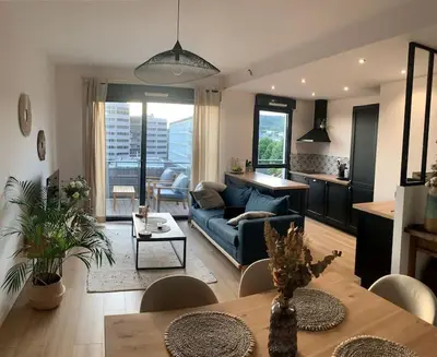 Coin salon dans l'établissement Appartement Rouen terrasse + parking