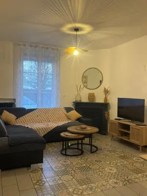 Coin salon dans l'établissement Gîte les Tilleuls
