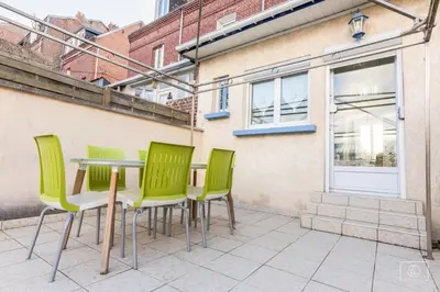 Balcon ou terrasse dans l'établissement maison jardin terrasse parking gratuit autour de la maison