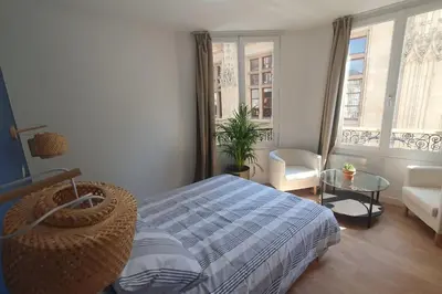 Un ou plusieurs lits dans un hébergement de l'établissement Appartement palais de justice