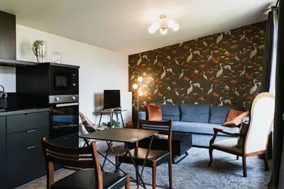 Cuisine ou kitchenette dans l'établissement Appartement les Glycines - Accès Piscine