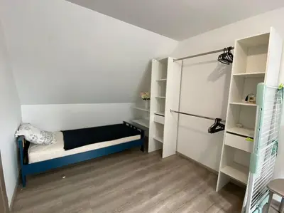 Un ou plusieurs lits dans un hébergement de l'établissement Appart à la ferme, chez Shoopie