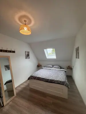 Un ou plusieurs lits dans un hébergement de l'établissement Appart à la ferme, chez Shoopie