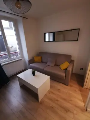 Coin salon dans l'établissement Appartement au coeur de la ville de Taverny