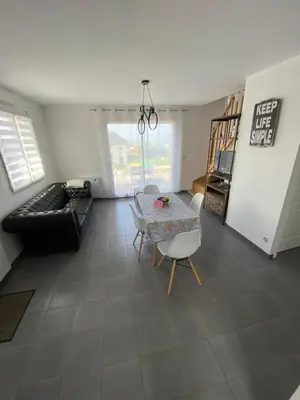Coin salon dans l'établissement Vue sur Mer