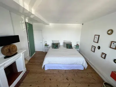 Un ou plusieurs lits dans un hébergement de l'établissement Location de maison Au fil de l O la Bouille