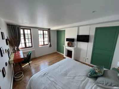 Un ou plusieurs lits dans un hébergement de l'établissement Location de maison Au fil de l O la Bouille